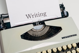 black and white typewriter on white table