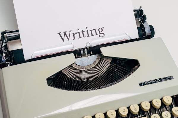 black and white typewriter on white tableby Markus Winkler