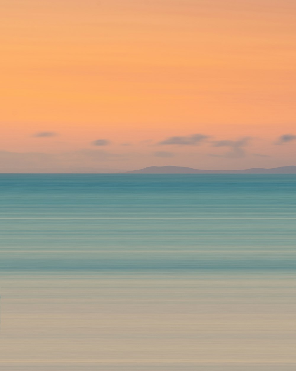 blue and orange sky over the sea