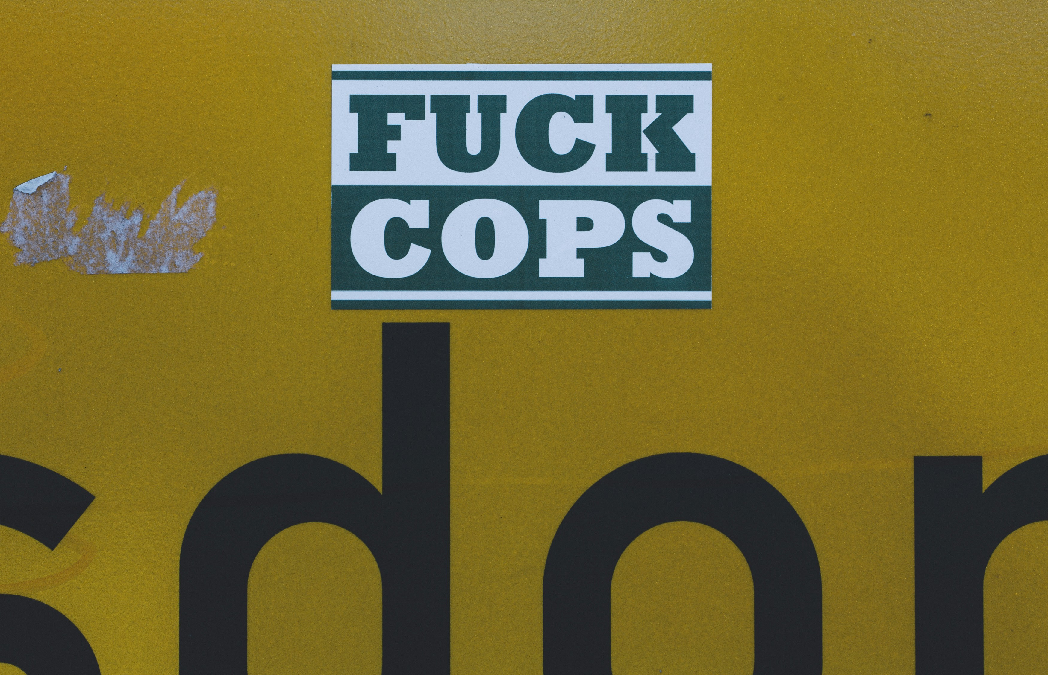 Vandalism – FUCK COPS – sticker. Made with Canon 5d Mark III and analog vintage lens, Leica APO Macro Elmarit-R 2.8 100mm (Year: 1993)