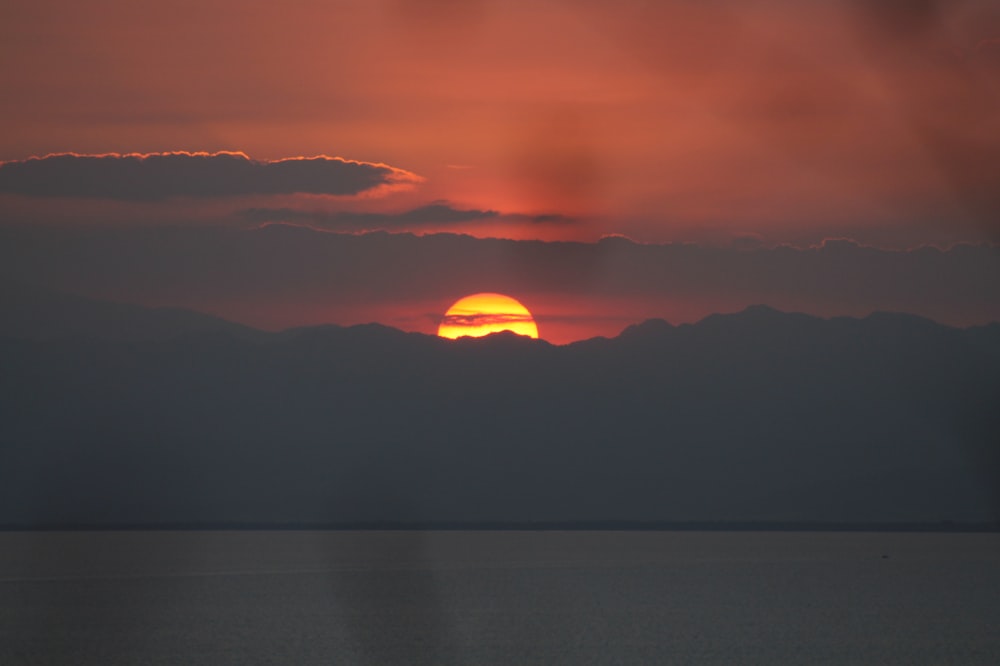 silhouette of mountain during sunset