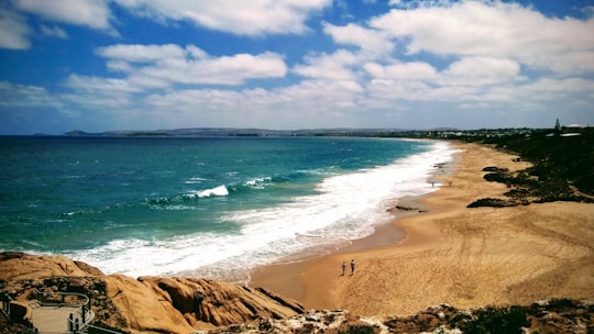 brown sand beach under blue sky and white clouds during daytime in South Australia Australia