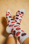 person wearing white and red socks