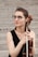 woman in black tank top playing brown violin