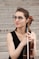 woman in black tank top playing brown violin