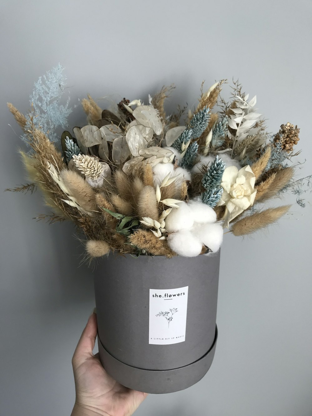 white and brown flower bouquet