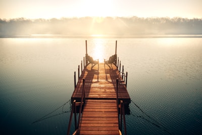 Guests enjoying a peaceful morning on the resort’s wooden dock.