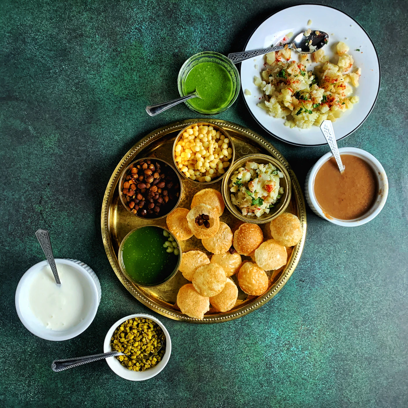 Pani poori with spiced potato and tangy water