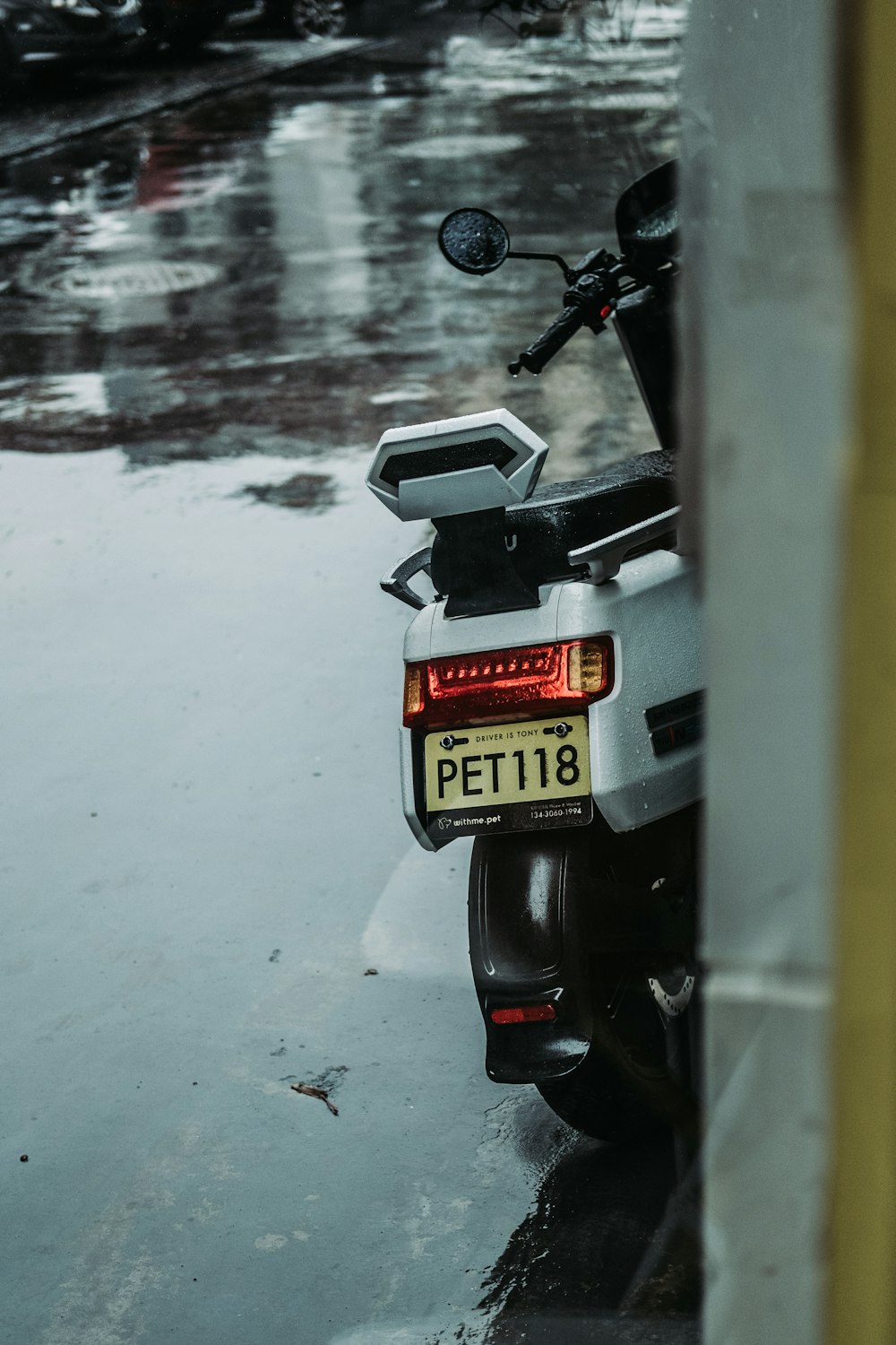 black and gray motorcycle on snow covered road