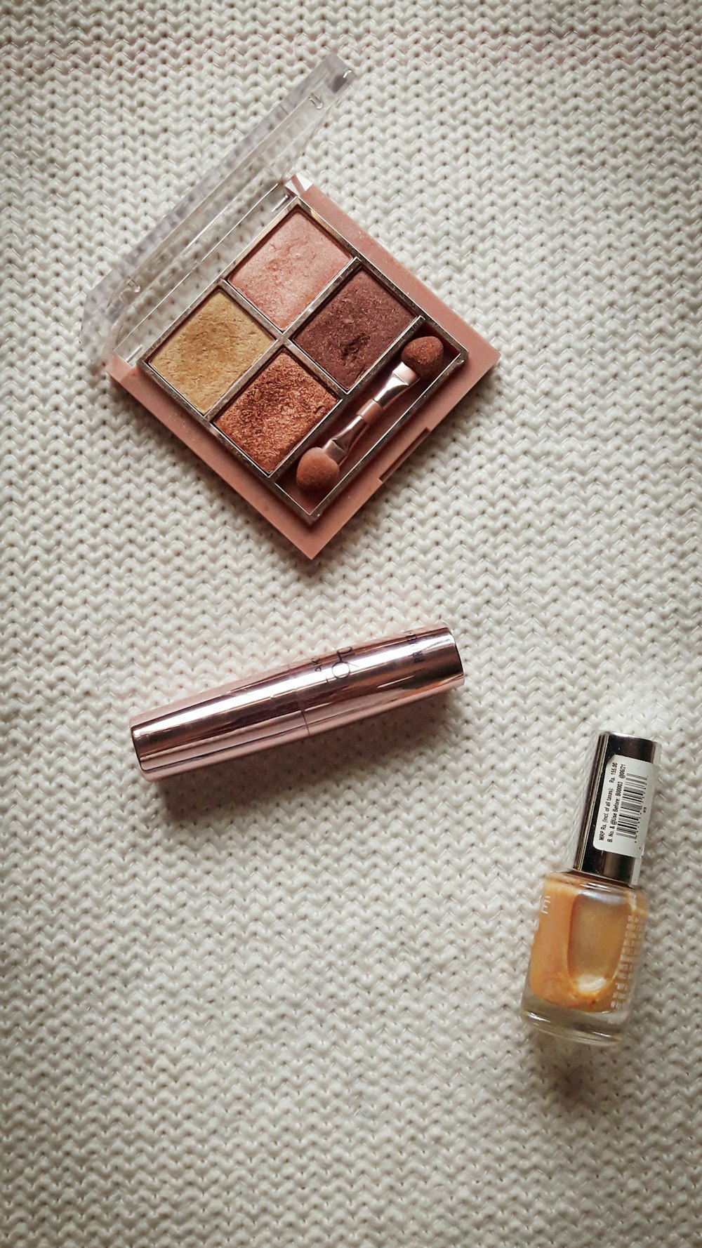 brown wooden box beside silver disposable lighter