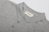 Elegant corporate polo shirts with subtle, embroidered company logos.