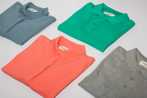 green crew neck shirt and gray crew neck shirt