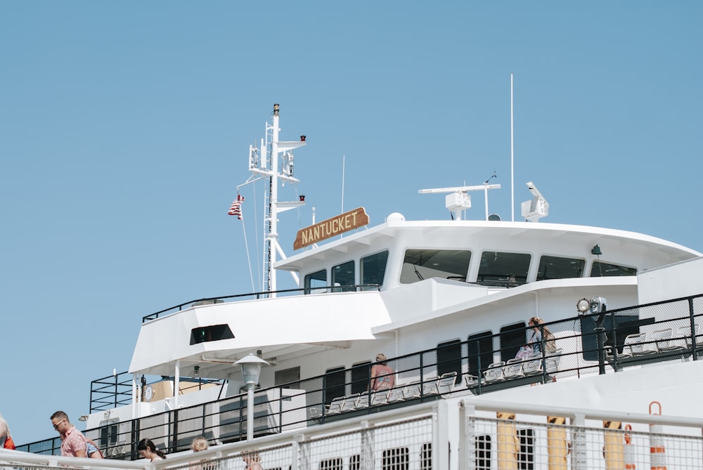 white ship on sea during daytime