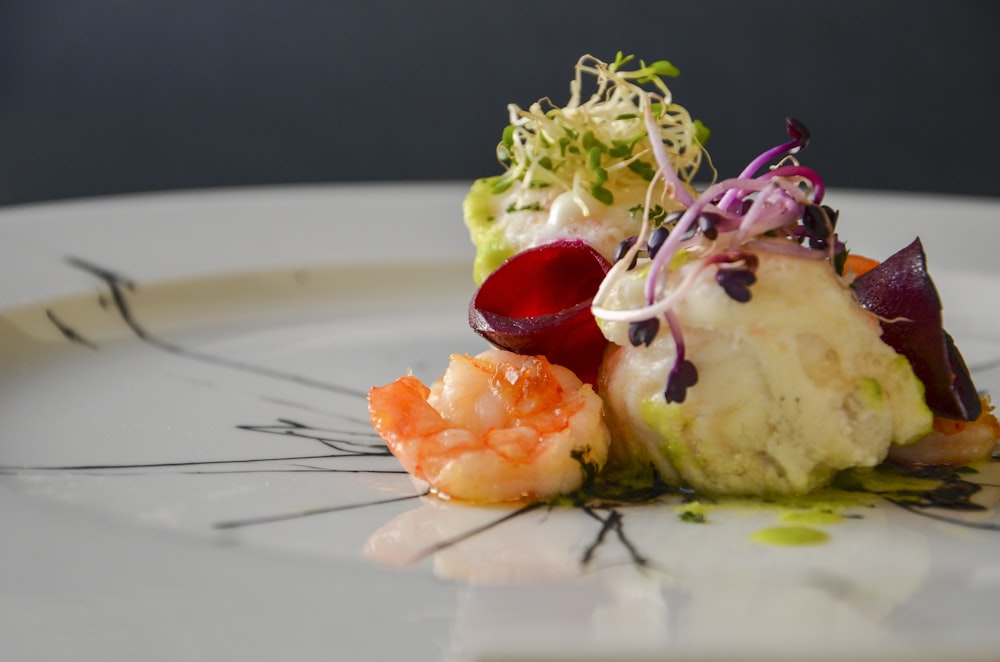 white and green vegetable salad on white ceramic plate