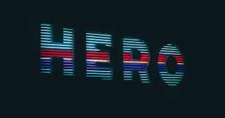 blue and red letter HERO