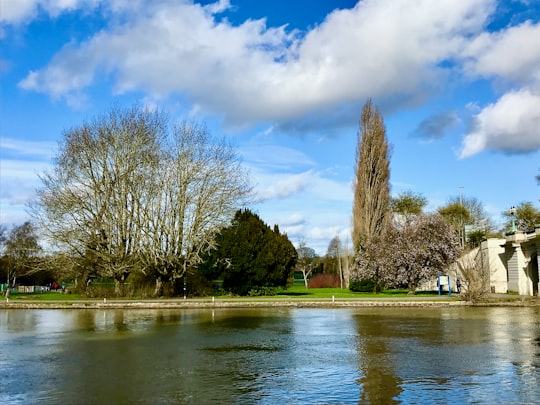 people riding on boat on river during daytime in England United Kingdom