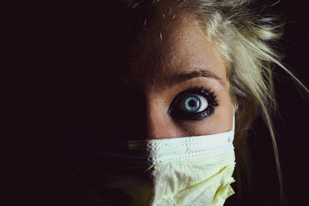 woman with white face mask