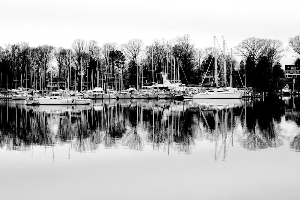 grayscale photo of boat on water