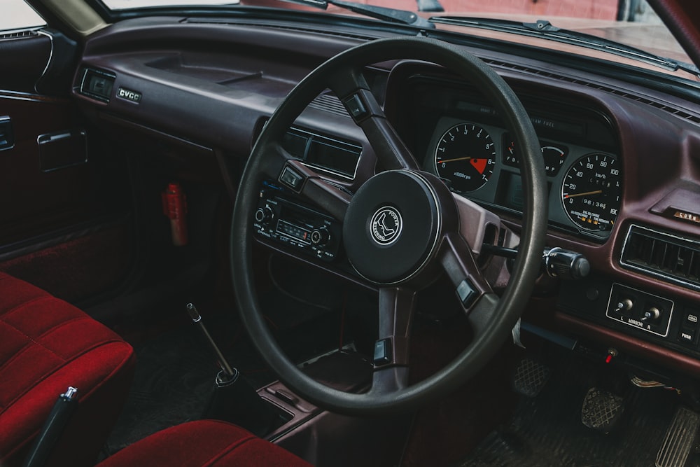 black and silver steering wheel