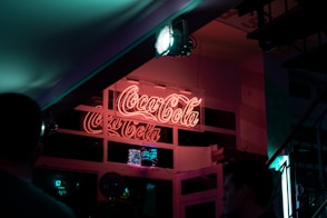 red and white love me neon light signage