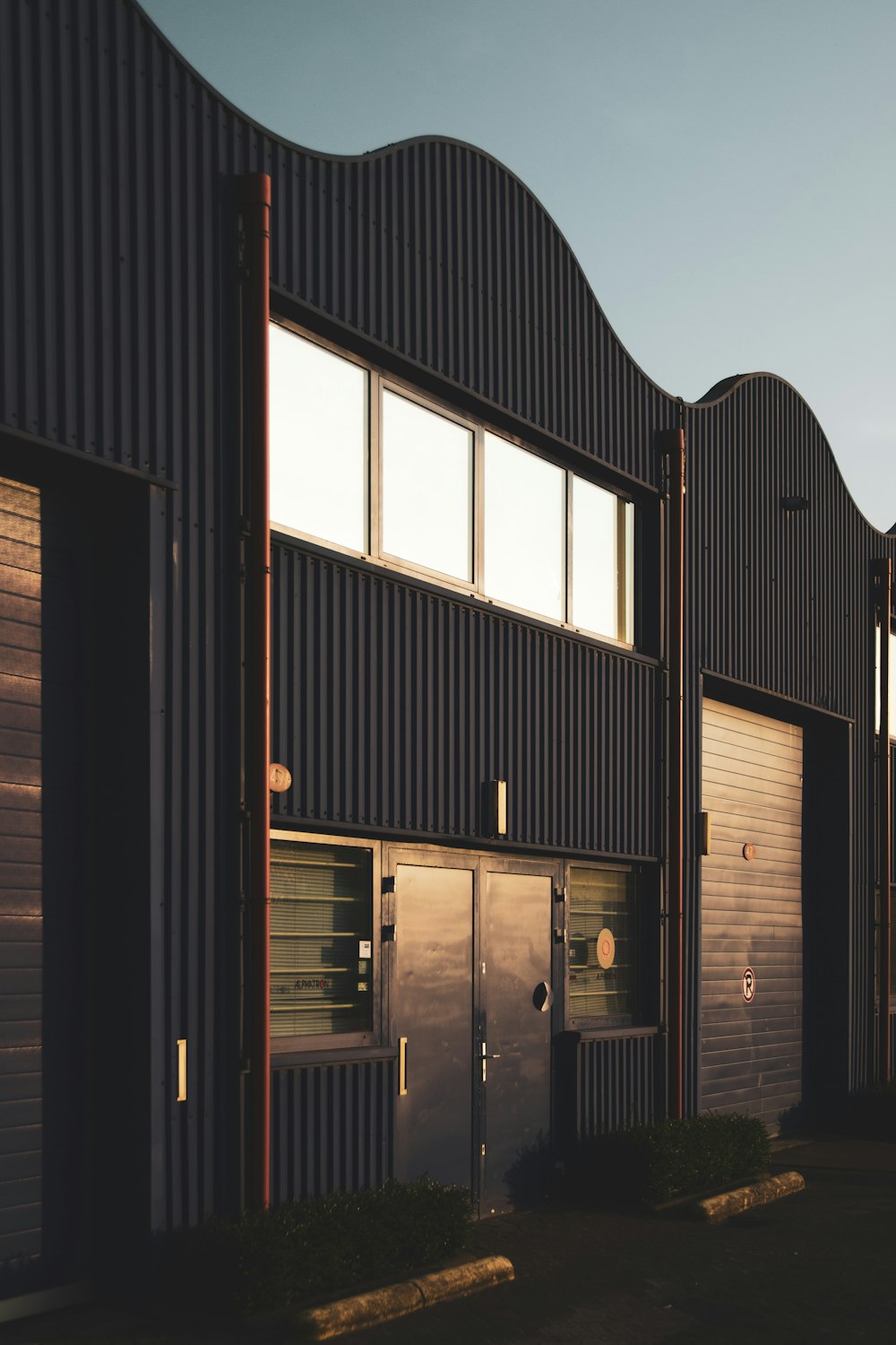 brown wooden house under blue sky during daytime