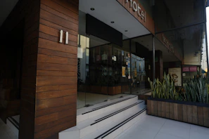 A community building entrance freshly renovated with clean lines and modern design.