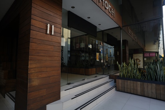 A sleek automatic sliding door installed at a modern commercial building entrance.