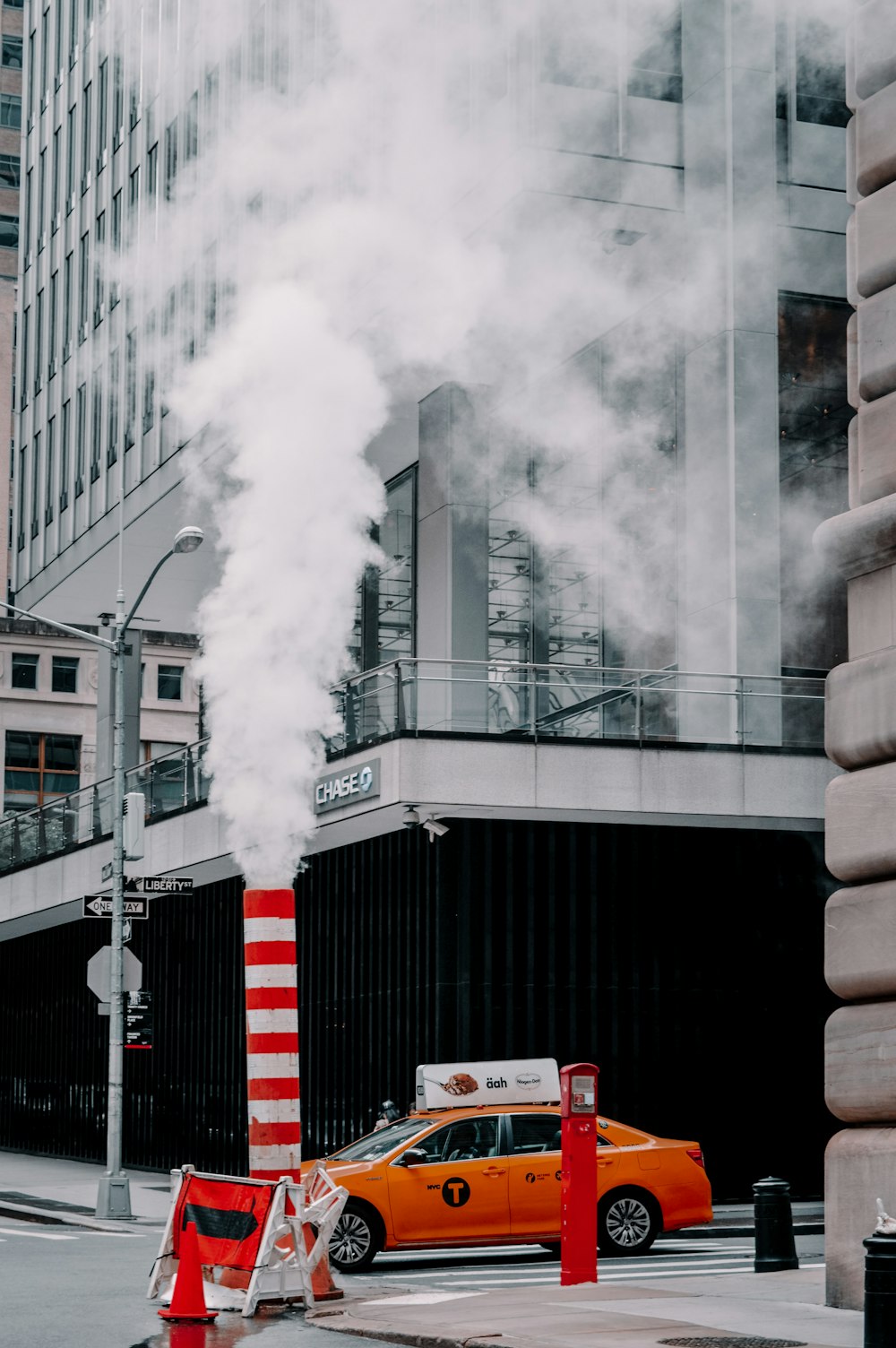 white smoke coming out from building