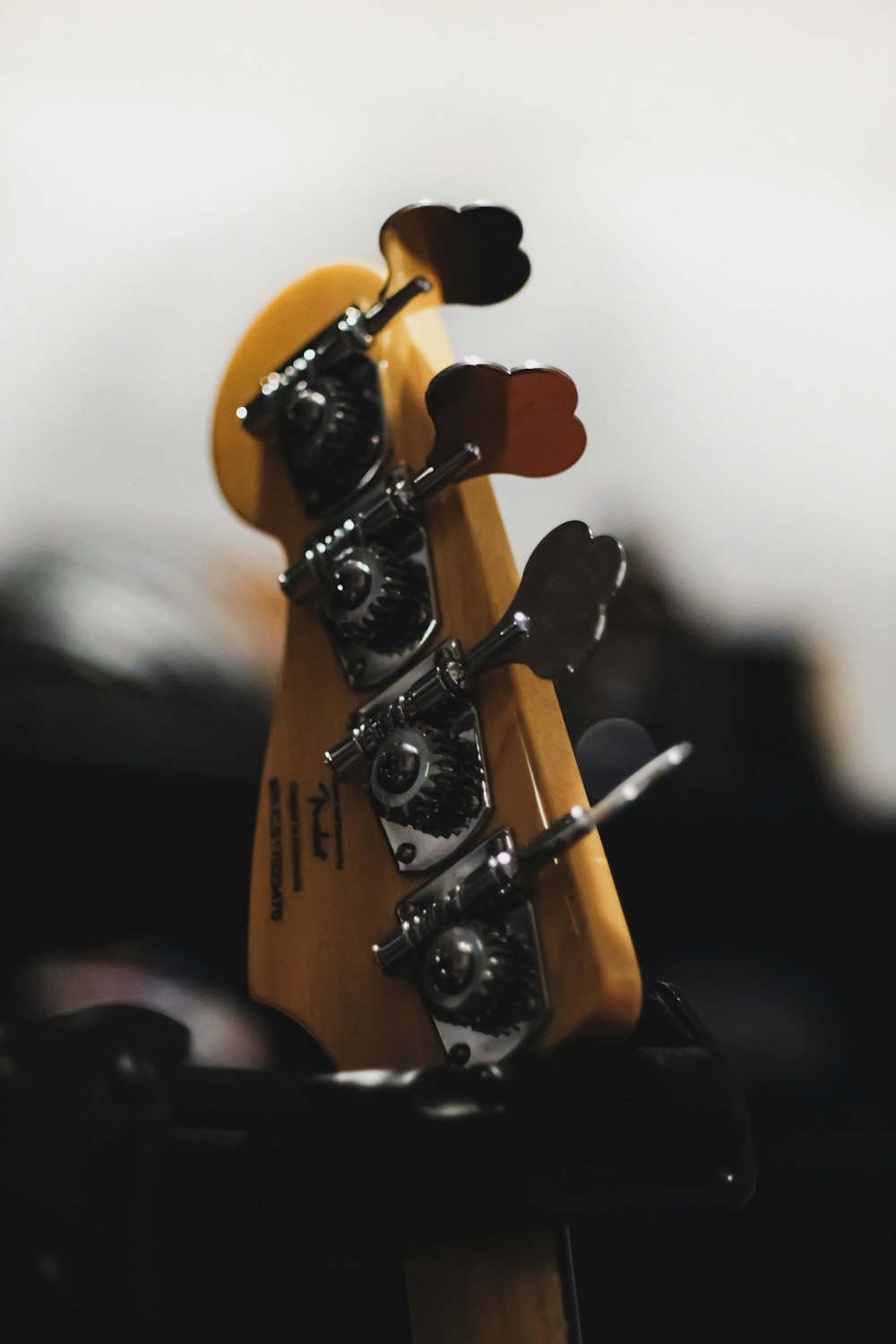 brown and black guitar head stock