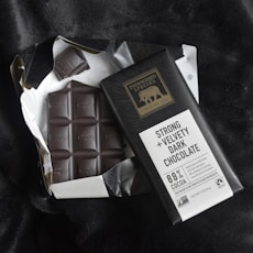 white and brown labeled chocolate bar