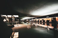 A private terminal entrance with discreet, elegant architecture hinting at refined exclusivity.