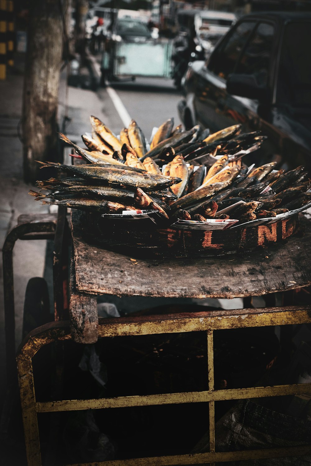 brown wooden stick on black metal fire pit