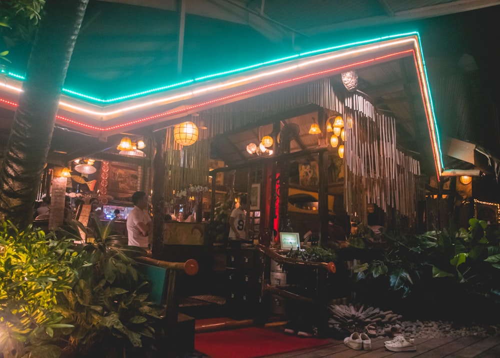 people sitting on chairs inside restaurant