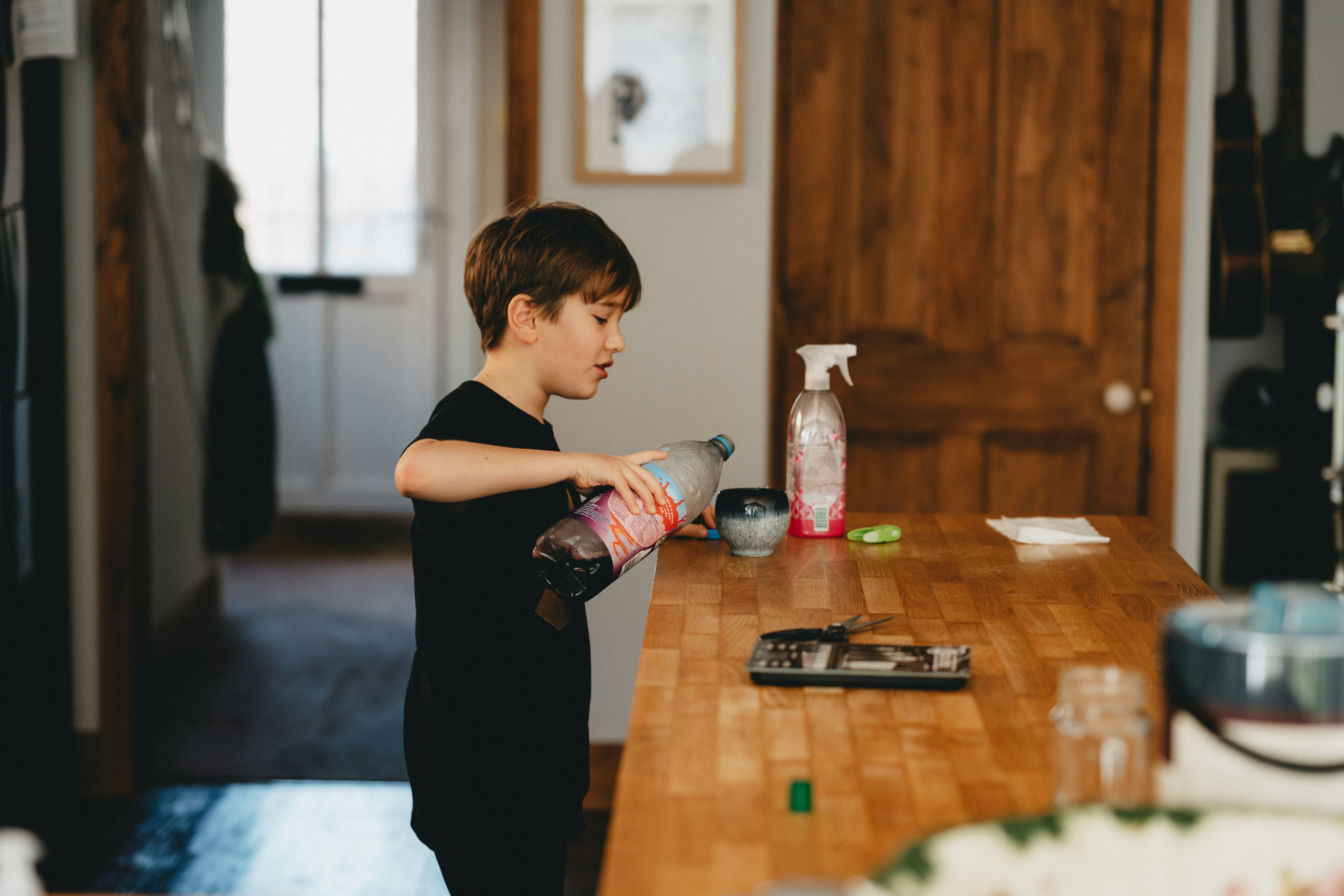 Child playing a cleaning game with a timer