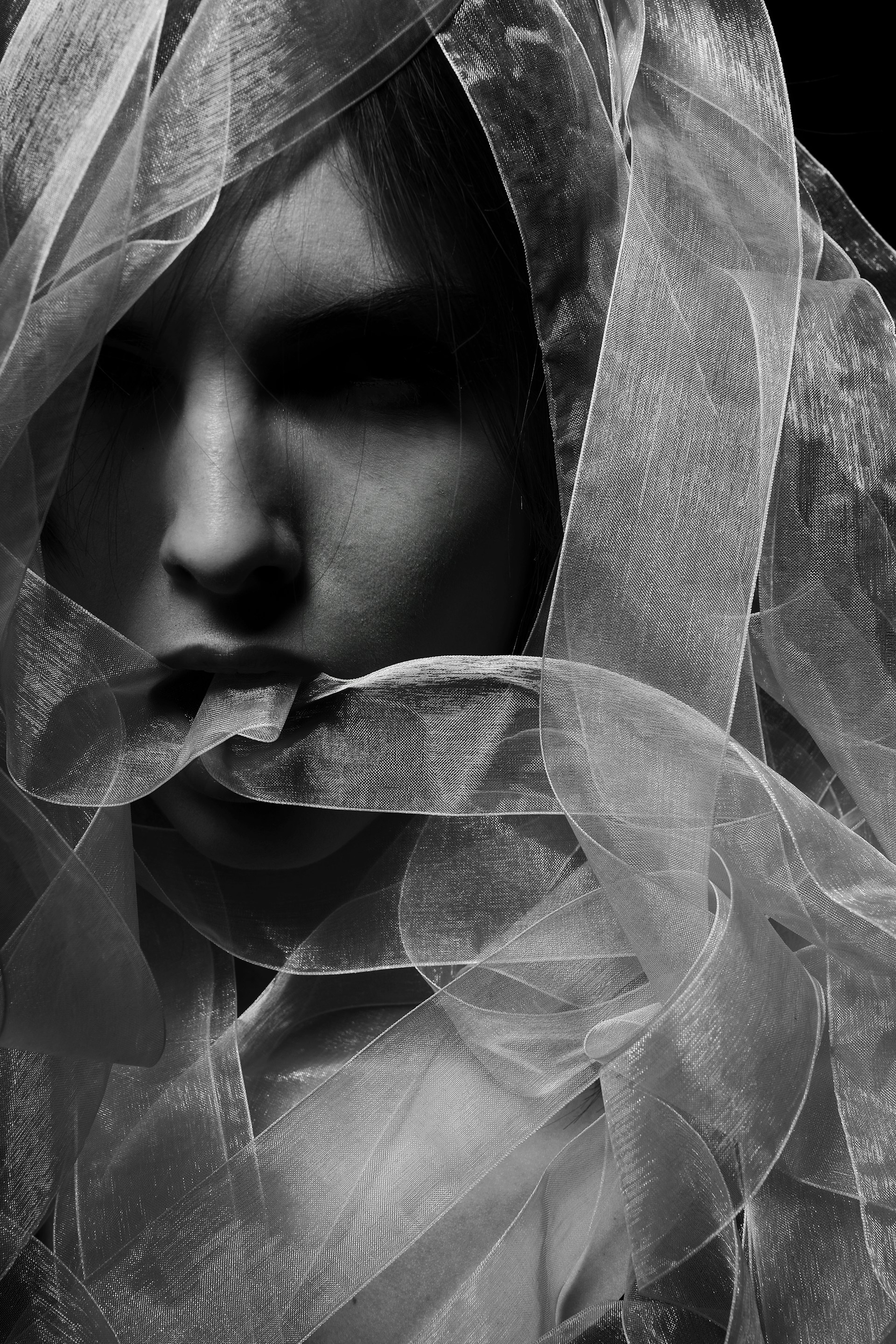 woman in white veil in grayscale