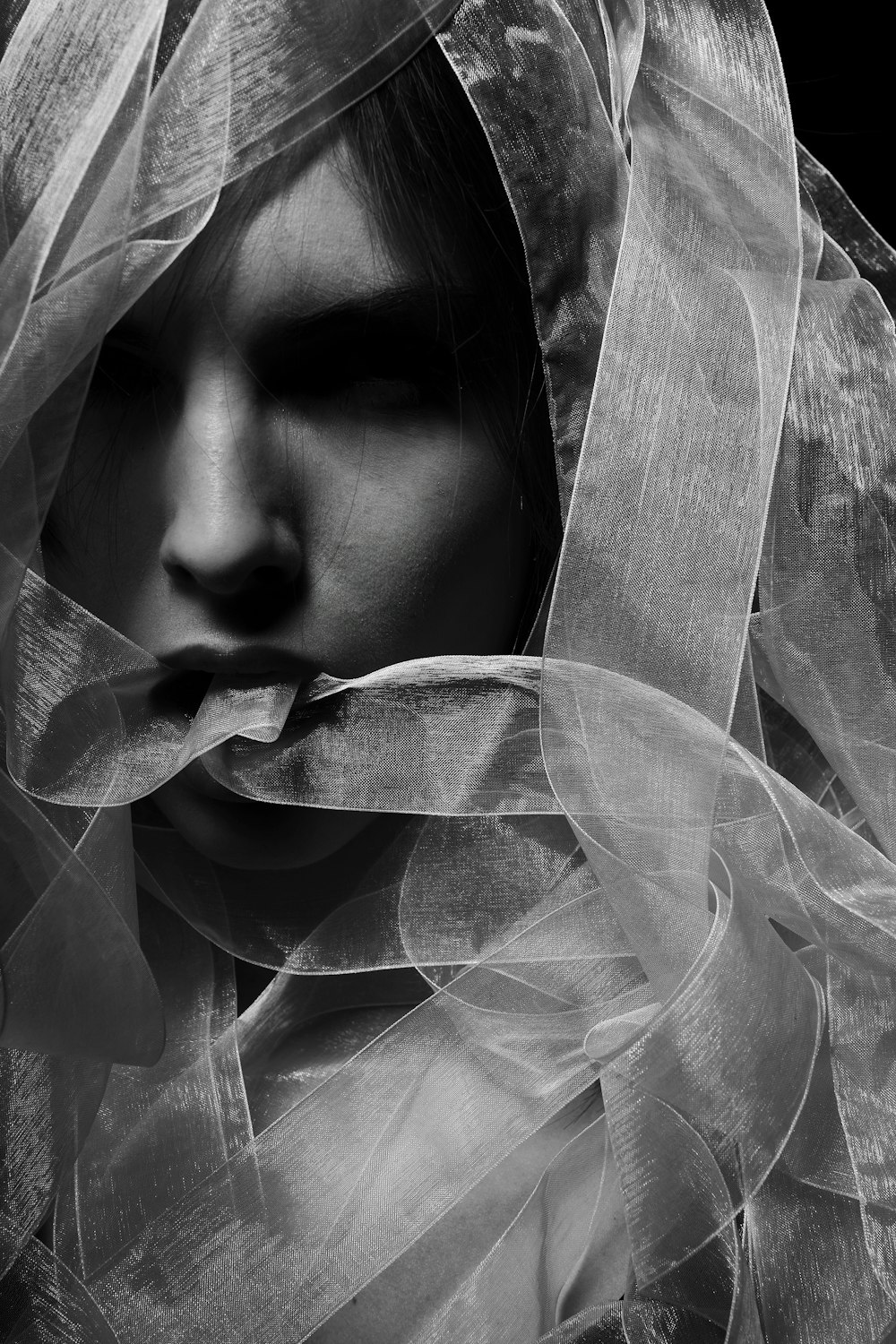 woman in white veil in grayscale