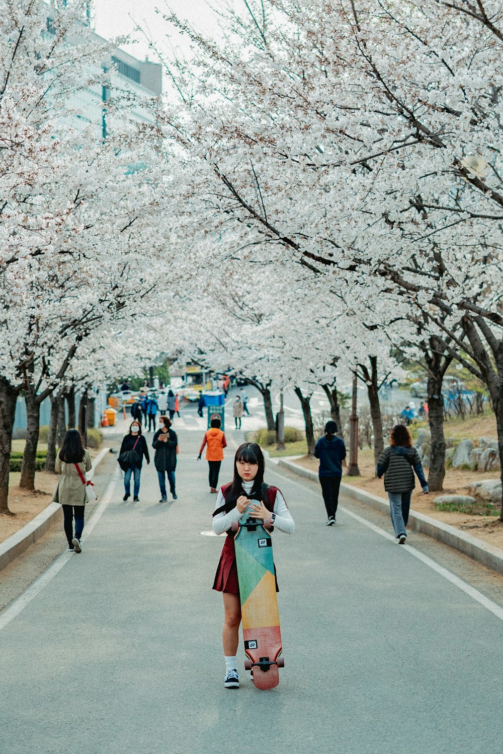 people walking on sidewalk during daytime