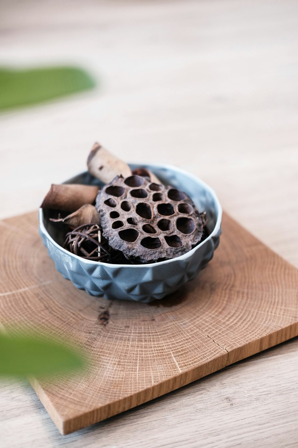 white and blue ceramic bowl with chocolate bars