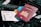 a passport and a boarding pass are on a bag