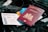 a passport and a boarding pass are on a bag