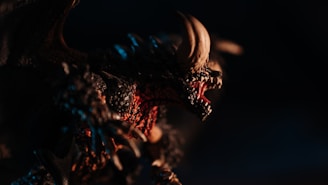 Close-up of a textured 3D creature with intricate scales and glowing eyes.