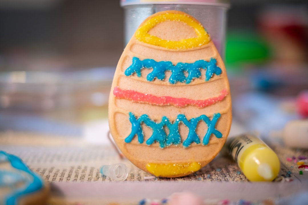 orange and blue ceramic egg ornament