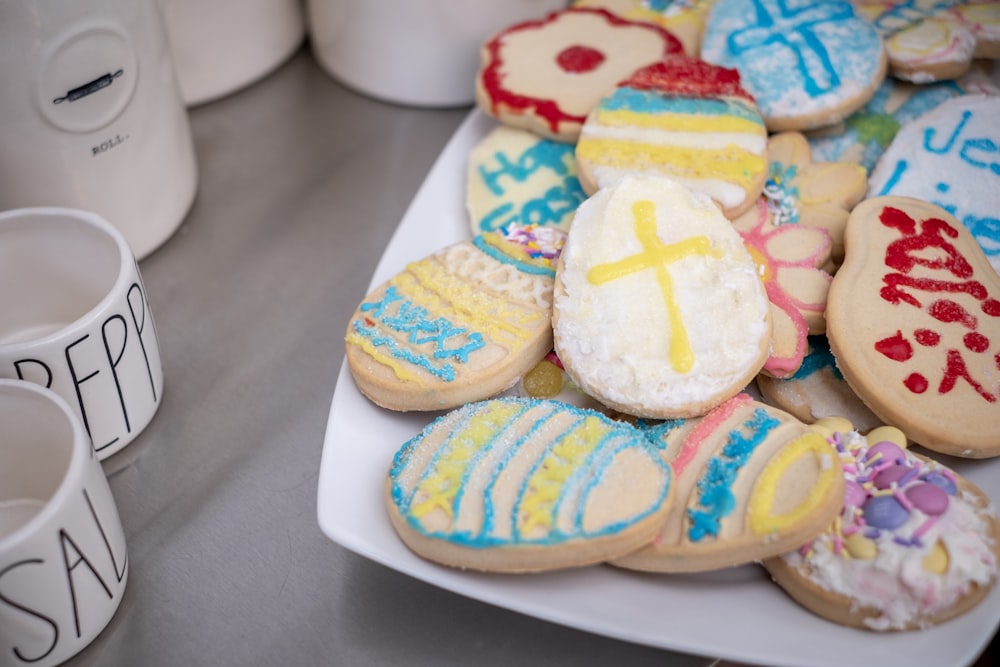 yellow and white cupcakes on white ceramic plate