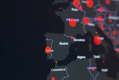A map highlighting Valoris branches in Bristol, Lisbon, and Madrid with connecting lines.