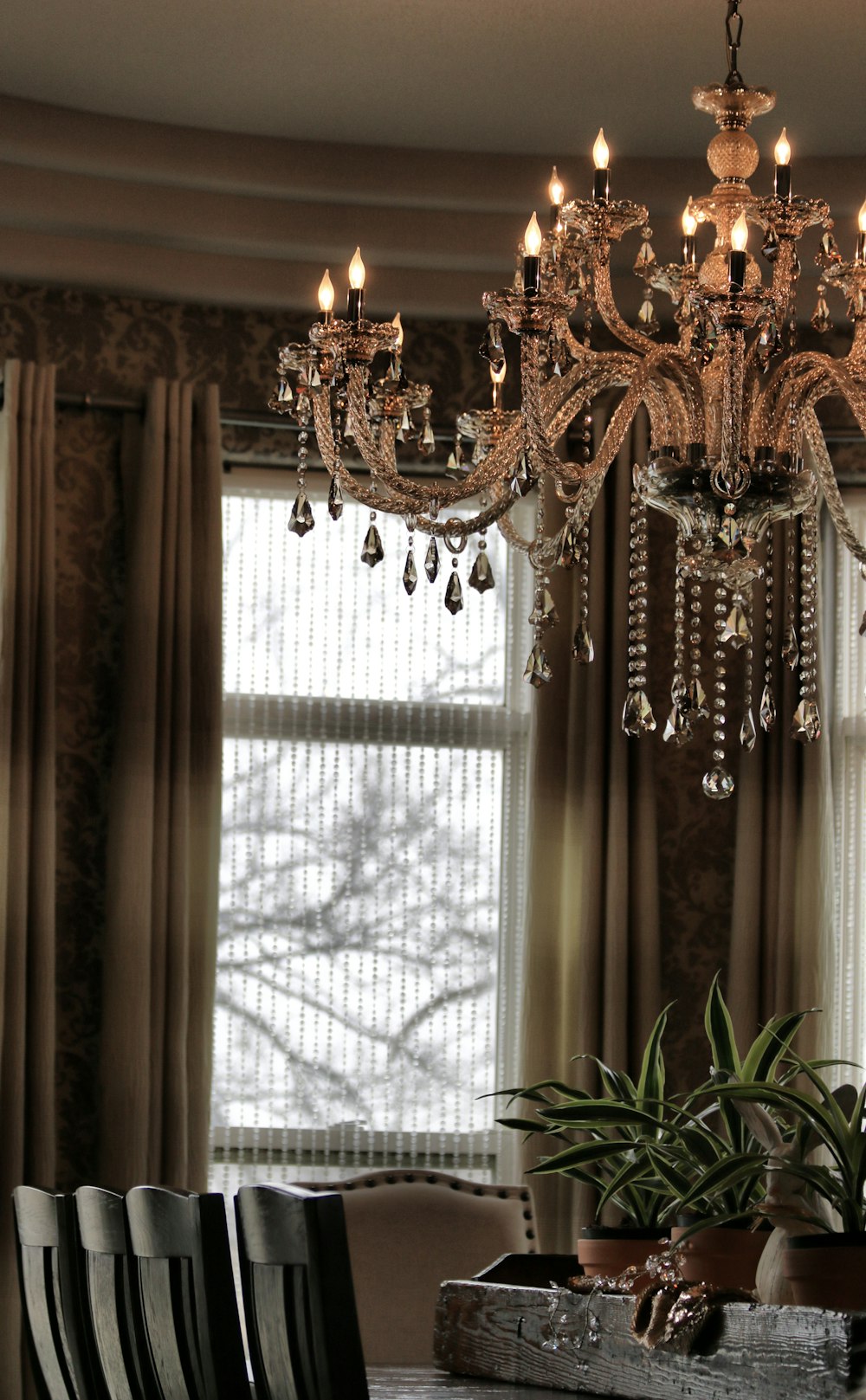 gold chandelier on white ceiling