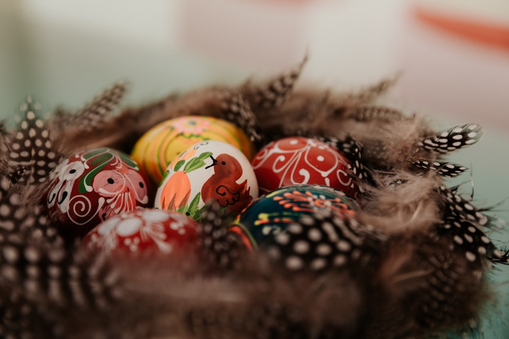 red and green baubles on brown nest