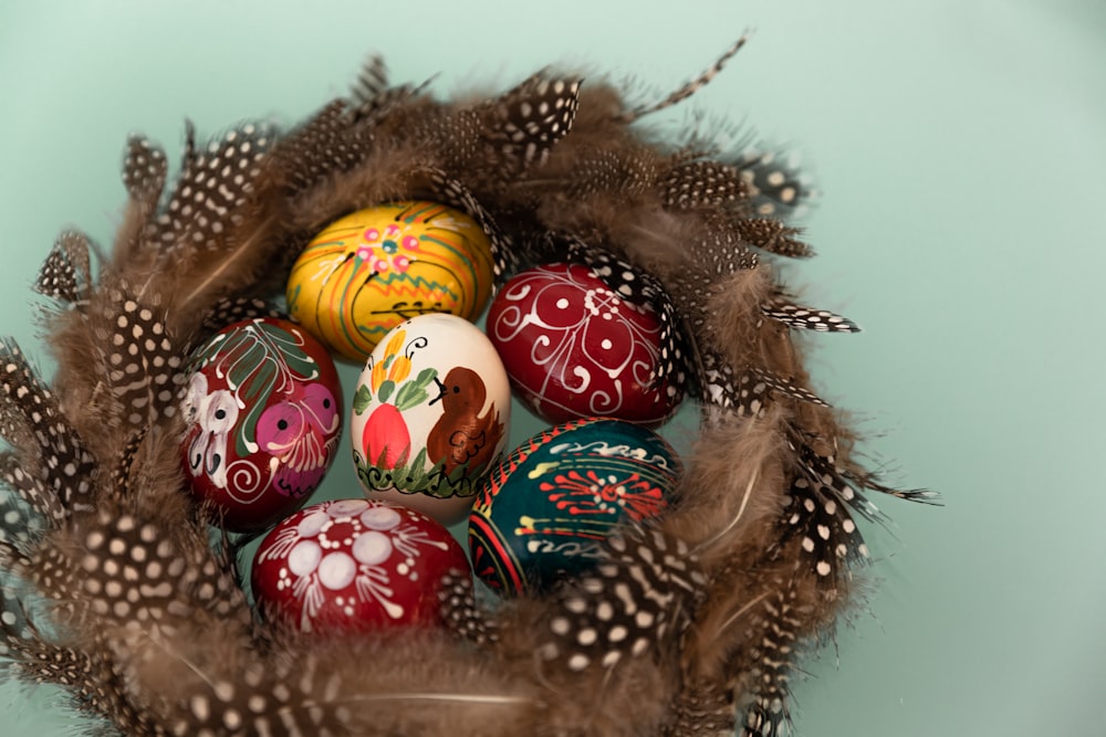 red and white baubles on brown nest