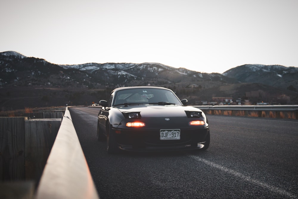 black porsche 911 on road during daytime