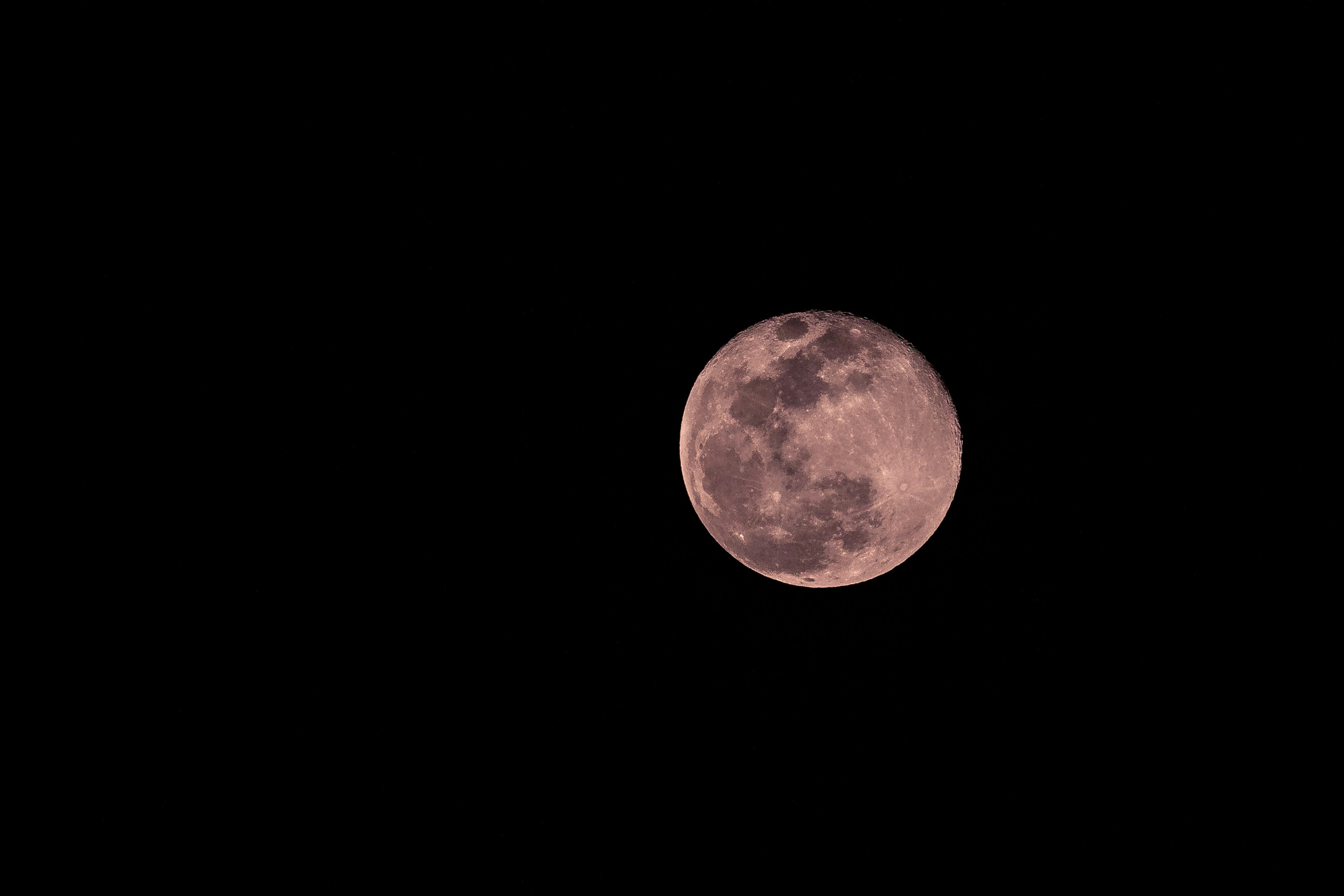 full moon in dark night sky