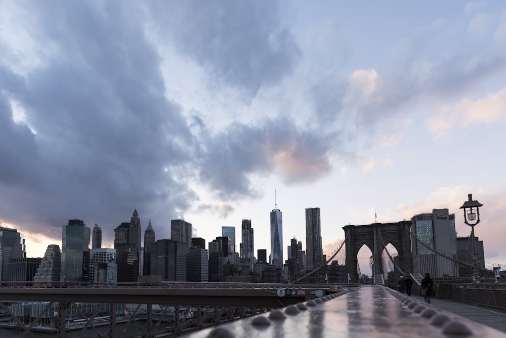 people walking on bridge during daytime